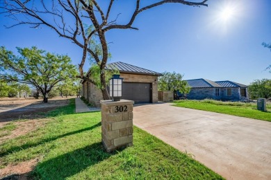 Stunning home nestled in the heart of Horseshoe Bay, Texas on Ram Rock Golf Course in Texas - for sale on GolfHomes.com, golf home, golf lot