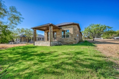 Stunning home nestled in the heart of Horseshoe Bay, Texas on Ram Rock Golf Course in Texas - for sale on GolfHomes.com, golf home, golf lot
