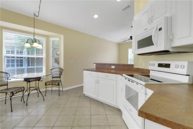 Experience luxury in this stunning end-unit Grandezza Coach Home on The Club At Grandezza in Florida - for sale on GolfHomes.com, golf home, golf lot