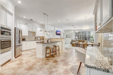 Welcome to your dream home in the desirable Kentford Gardens on Heathrow Country Club in Florida - for sale on GolfHomes.com, golf home, golf lot