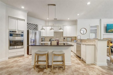 Welcome to your dream home in the desirable Kentford Gardens on Heathrow Country Club in Florida - for sale on GolfHomes.com, golf home, golf lot