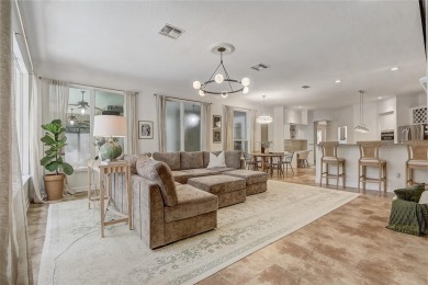 Welcome to your dream home in the desirable Kentford Gardens on Heathrow Country Club in Florida - for sale on GolfHomes.com, golf home, golf lot
