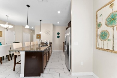 This townhome doesn't just check boxes -- it delivers the kind on The Oasis Club at Champions Gate in Florida - for sale on GolfHomes.com, golf home, golf lot