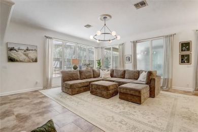 Welcome to your dream home in the desirable Kentford Gardens on Heathrow Country Club in Florida - for sale on GolfHomes.com, golf home, golf lot