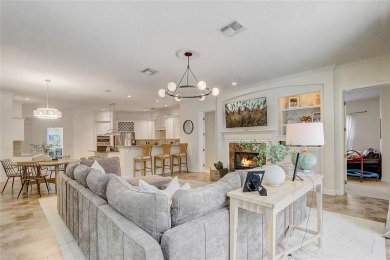 Welcome to your dream home in the desirable Kentford Gardens on Heathrow Country Club in Florida - for sale on GolfHomes.com, golf home, golf lot