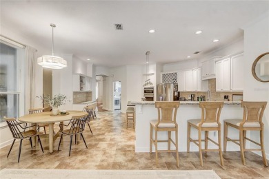 Welcome to your dream home in the desirable Kentford Gardens on Heathrow Country Club in Florida - for sale on GolfHomes.com, golf home, golf lot