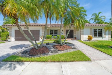 This charming 3-bed/2.5-bath home with a screened-in pool has a on Bonaventure Country Club in Florida - for sale on GolfHomes.com, golf home, golf lot