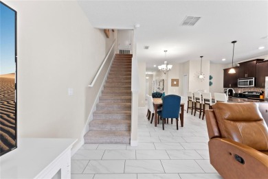 This townhome doesn't just check boxes -- it delivers the kind on The Oasis Club at Champions Gate in Florida - for sale on GolfHomes.com, golf home, golf lot