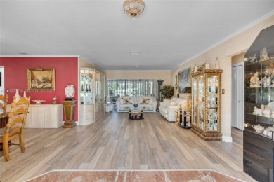 This charming 3-bed/2.5-bath home with a screened-in pool has a on Bonaventure Country Club in Florida - for sale on GolfHomes.com, golf home, golf lot