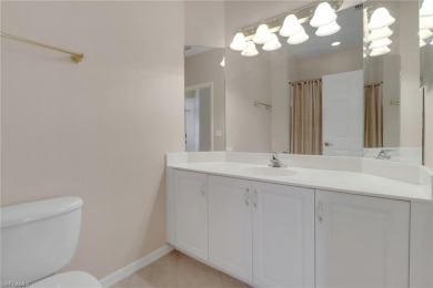 Experience luxury in this stunning end-unit Grandezza Coach Home on The Club At Grandezza in Florida - for sale on GolfHomes.com, golf home, golf lot