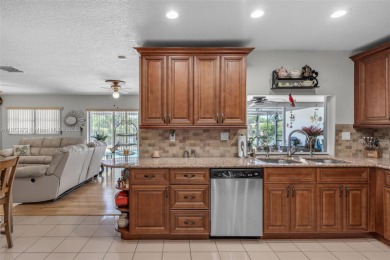 This charming 3-bed/2.5-bath home with a screened-in pool has a on Bonaventure Country Club in Florida - for sale on GolfHomes.com, golf home, golf lot