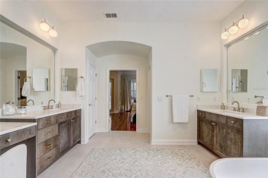 Welcome to your dream home in the desirable Kentford Gardens on Heathrow Country Club in Florida - for sale on GolfHomes.com, golf home, golf lot