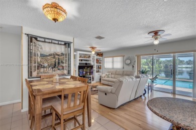 This charming 3-bed/2.5-bath home with a screened-in pool has a on Bonaventure Country Club in Florida - for sale on GolfHomes.com, golf home, golf lot