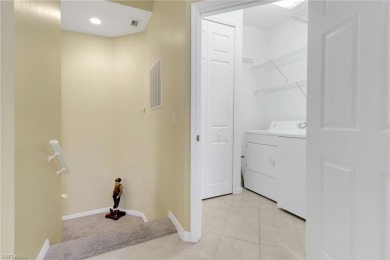 Experience luxury in this stunning end-unit Grandezza Coach Home on The Club At Grandezza in Florida - for sale on GolfHomes.com, golf home, golf lot