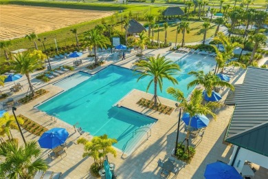 This townhome doesn't just check boxes -- it delivers the kind on The Oasis Club at Champions Gate in Florida - for sale on GolfHomes.com, golf home, golf lot