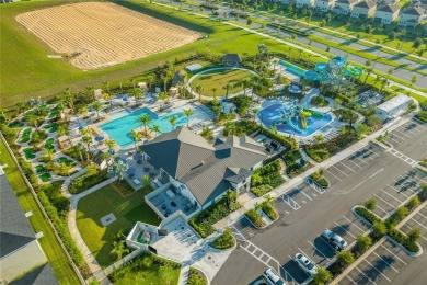 This townhome doesn't just check boxes -- it delivers the kind on The Oasis Club at Champions Gate in Florida - for sale on GolfHomes.com, golf home, golf lot
