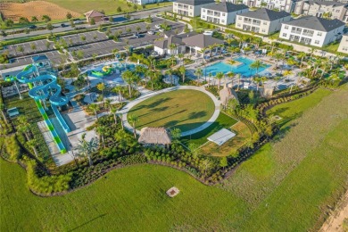 This townhome doesn't just check boxes -- it delivers the kind on The Oasis Club at Champions Gate in Florida - for sale on GolfHomes.com, golf home, golf lot