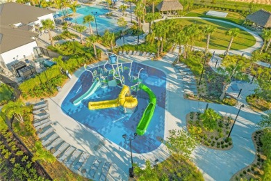 This townhome doesn't just check boxes -- it delivers the kind on The Oasis Club at Champions Gate in Florida - for sale on GolfHomes.com, golf home, golf lot