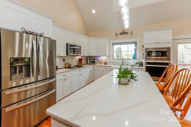 Experience luxury golf course living at 896 Moss Drive on Cleghorn Plantation Golf Club in North Carolina - for sale on GolfHomes.com, golf home, golf lot