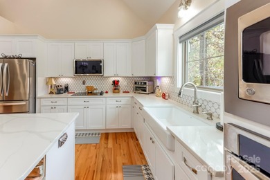 Experience luxury golf course living at 896 Moss Drive on Cleghorn Plantation Golf Club in North Carolina - for sale on GolfHomes.com, golf home, golf lot