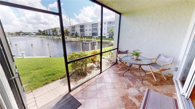 PUNTA GORDA ISLES WATERFRONT MAINTENANCE FREE: Experience the on Saint Andrews South Golf Club in Florida - for sale on GolfHomes.com, golf home, golf lot