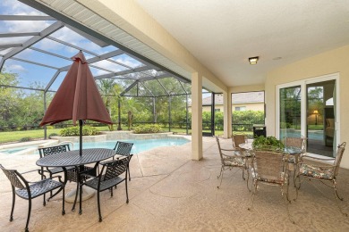 Beautifully situated on a private cul-de-sac backing to a nature on Baytree National Golf Links in Florida - for sale on GolfHomes.com, golf home, golf lot