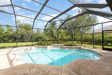 Beautifully situated on a private cul-de-sac backing to a nature on Baytree National Golf Links in Florida - for sale on GolfHomes.com, golf home, golf lot