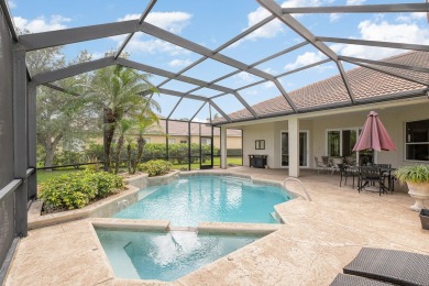 Beautifully situated on a private cul-de-sac backing to a nature on Baytree National Golf Links in Florida - for sale on GolfHomes.com, golf home, golf lot