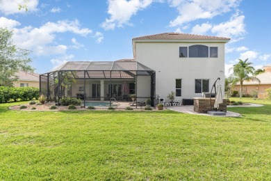 Beautifully situated on a private cul-de-sac backing to a nature on Baytree National Golf Links in Florida - for sale on GolfHomes.com, golf home, golf lot