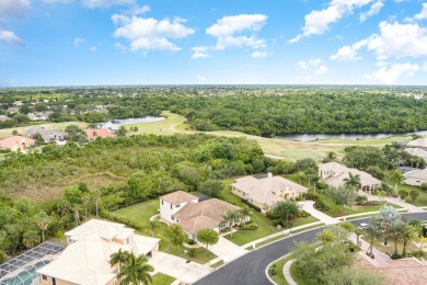 Beautifully situated on a private cul-de-sac backing to a nature on Baytree National Golf Links in Florida - for sale on GolfHomes.com, golf home, golf lot