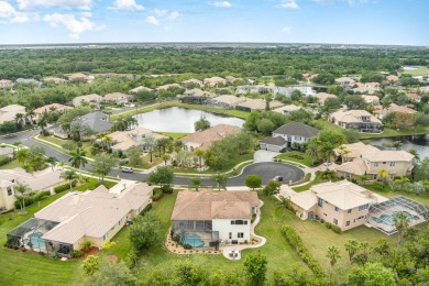 Beautifully situated on a private cul-de-sac backing to a nature on Baytree National Golf Links in Florida - for sale on GolfHomes.com, golf home, golf lot