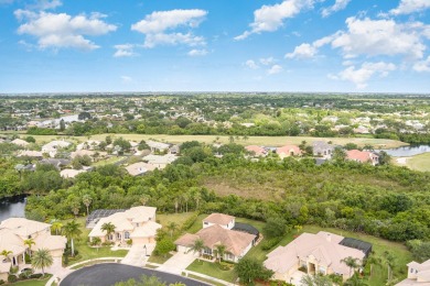 Beautifully situated on a private cul-de-sac backing to a nature on Baytree National Golf Links in Florida - for sale on GolfHomes.com, golf home, golf lot