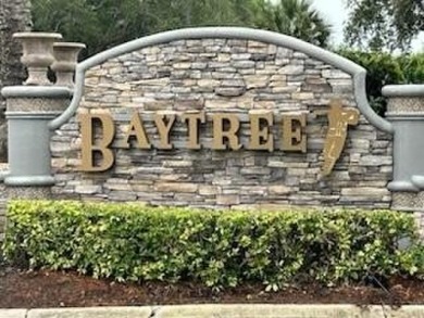 Beautifully situated on a private cul-de-sac backing to a nature on Baytree National Golf Links in Florida - for sale on GolfHomes.com, golf home, golf lot