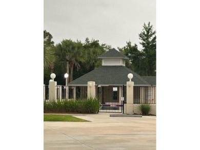 Beautifully situated on a private cul-de-sac backing to a nature on Baytree National Golf Links in Florida - for sale on GolfHomes.com, golf home, golf lot