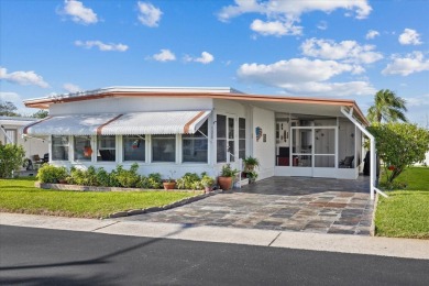 Charming 2-Bed, 2-Bath Home in 55+ Stonehenge Mobile Home Park - on Tarpon Springs Golf Course in Florida - for sale on GolfHomes.com, golf home, golf lot