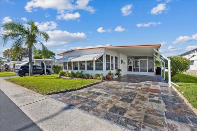 Charming 2-Bed, 2-Bath Home in 55+ Stonehenge Mobile Home Park - on Tarpon Springs Golf Course in Florida - for sale on GolfHomes.com, golf home, golf lot
