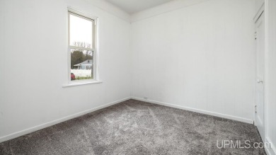 This spacious and charming 4 bedroom, 1.5 bath home is move-in on Pine Grove Country Club in Michigan - for sale on GolfHomes.com, golf home, golf lot
