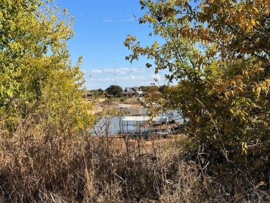Vacant lot backs to Bridgeport Lake in the community of Runaway on The Club At Runaway Bay in Texas - for sale on GolfHomes.com, golf home, golf lot