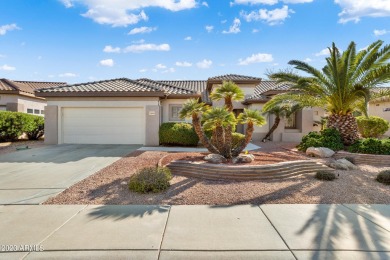 Stonecrest model is situated on a spacious lot with a fenced on Sun City Grand Golf Couse and Club in Arizona - for sale on GolfHomes.com, golf home, golf lot