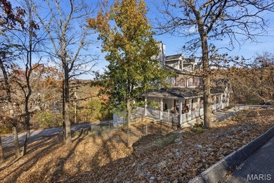 This stunning two-story home offers over 4,000 square feet of on Raintree Country Club in Missouri - for sale on GolfHomes.com, golf home, golf lot