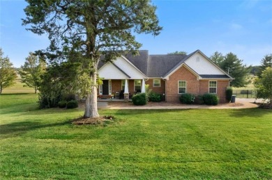 Welcome to this stunning 4-bedroom, 2.5-bath brick home nestled on Meadow Lakes Golf Course in Georgia - for sale on GolfHomes.com, golf home, golf lot