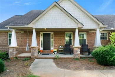 Welcome to this stunning 4-bedroom, 2.5-bath brick home nestled on Meadow Lakes Golf Course in Georgia - for sale on GolfHomes.com, golf home, golf lot