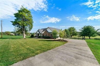 Welcome to this stunning 4-bedroom, 2.5-bath brick home nestled on Meadow Lakes Golf Course in Georgia - for sale on GolfHomes.com, golf home, golf lot