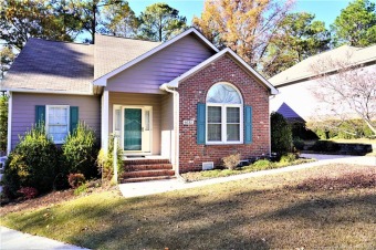 Come and check out this 1.5 story brick and siding home in the on Kings Grant Golf and Country Club in North Carolina - for sale on GolfHomes.com, golf home, golf lot