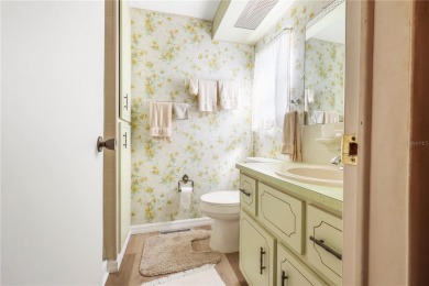 **NEW SUBFLOORS AND VINYL PLANK FLOORING INSTALLED JAN 2025** on Maple Leaf Golf and Country Club in Florida - for sale on GolfHomes.com, golf home, golf lot