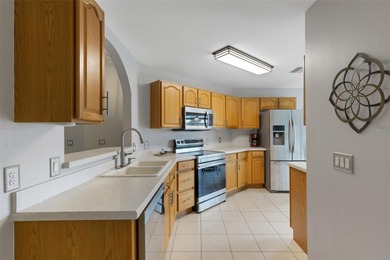 Located in the 55+ community of High Vista, this Ridge Crest on Ridgewood Lakes Golf and Country Club in Florida - for sale on GolfHomes.com, golf home, golf lot