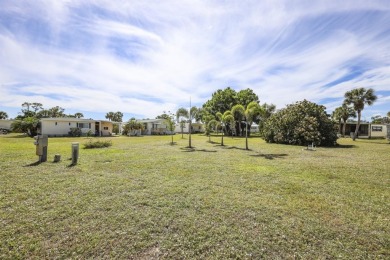 **NEW SUBFLOORS AND VINYL PLANK FLOORING INSTALLED JAN 2025** on Maple Leaf Golf and Country Club in Florida - for sale on GolfHomes.com, golf home, golf lot