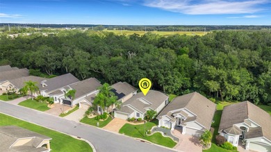 Located in the 55+ community of High Vista, this Ridge Crest on Ridgewood Lakes Golf and Country Club in Florida - for sale on GolfHomes.com, golf home, golf lot