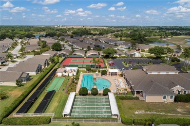Located in the 55+ community of High Vista, this Ridge Crest on Ridgewood Lakes Golf and Country Club in Florida - for sale on GolfHomes.com, golf home, golf lot