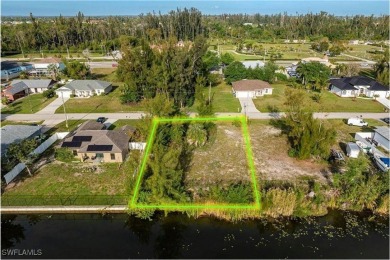 Located in the highly sought-after area of Central Cape Coral on Palmetto-Pine Country Club in Florida - for sale on GolfHomes.com, golf home, golf lot